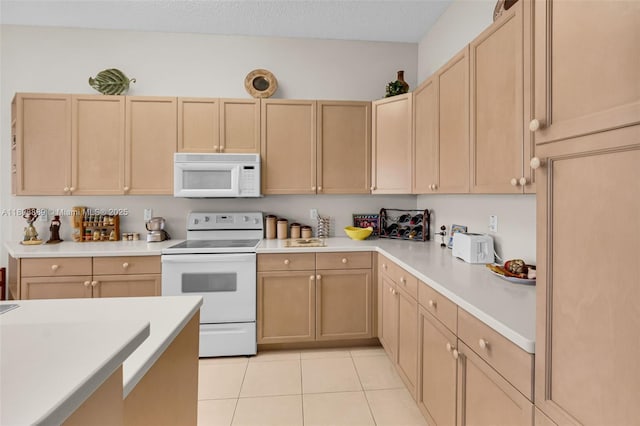 7059 Copperfield Cir, Lake Worth, FL 33467 - kitchen featuring white appliances, light brown cabinets, light countertops, and light tile patterned floors