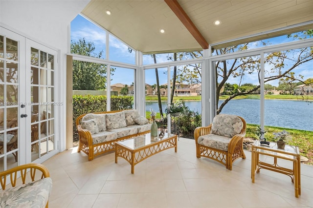 7059 Copperfield Cir, Lake Worth, FL 33467 - sunroom / solarium with a water view, french doors, tile patterned floors, an outdoor hangout area, and high vaulted ceiling