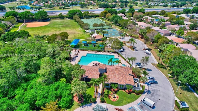 7059 Copperfield Cir, Lake Worth, FL 33467 - aerial view of property and surrounding area featuring a pool area