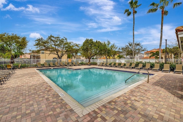 7059 Copperfield Cir, Lake Worth, FL 33467 - community pool featuring a patio and a residential view