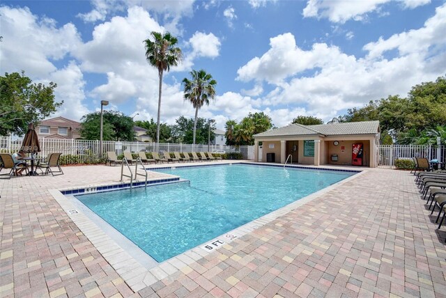 7059 Copperfield Cir, Lake Worth, FL 33467 - community pool with a patio