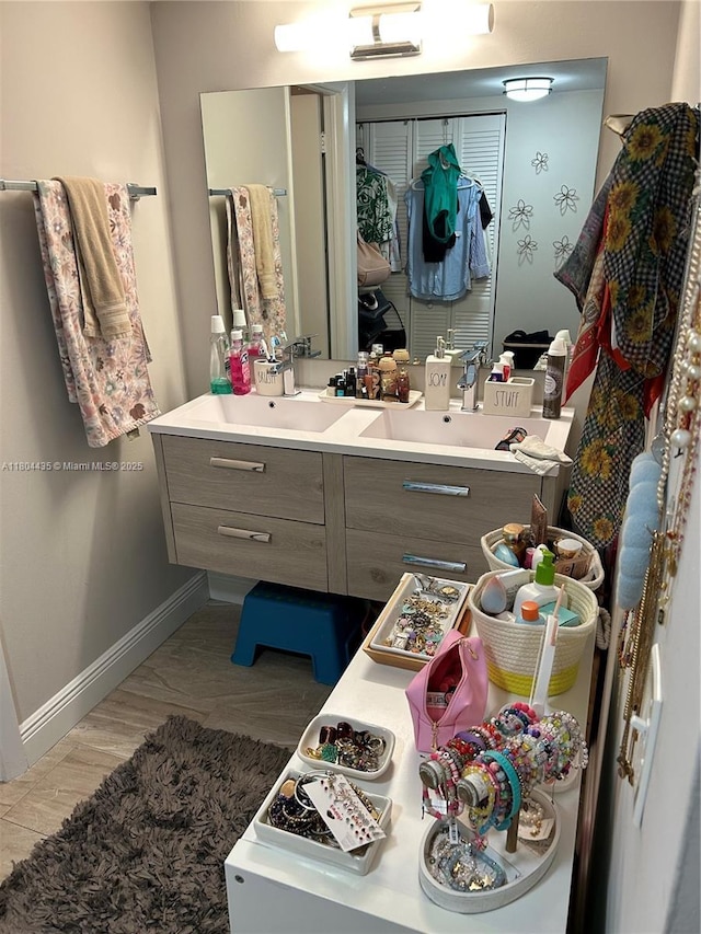 575 Crandon Blvd Unit 808, Key Biscayne, FL 33149 - bathroom featuring vanity and baseboards