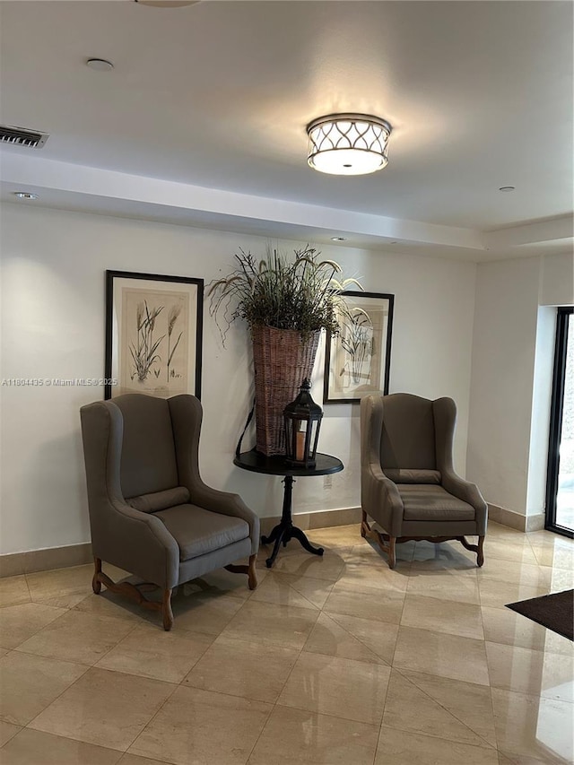 575 Crandon Blvd Unit 808, Key Biscayne, FL 33149 - sitting room with baseboards and light tile patterned floors
