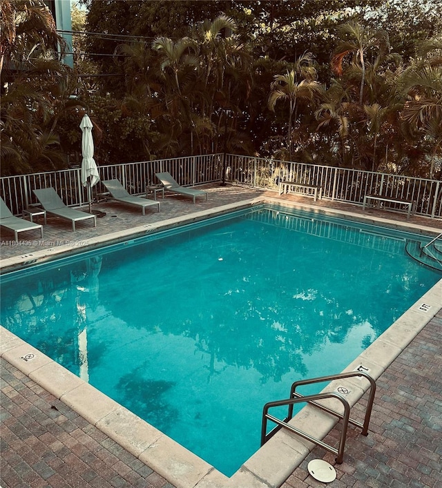 575 Crandon Blvd Unit 808, Key Biscayne, FL 33149 - community pool with a patio area