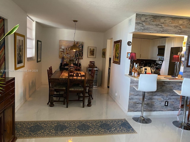 1811 Jefferson St Unit 607, Hollywood, FL 33020 - dining space with wine cooler and baseboards