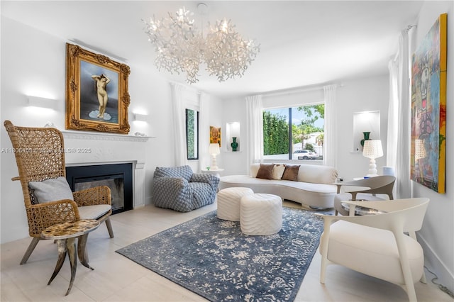 5970 Alton Rd, Miami Beach, FL 33140 - living area with a glass covered fireplace and a chandelier