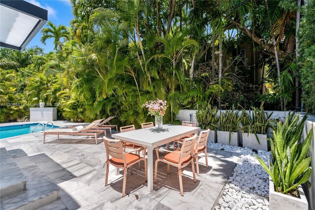 5970 Alton Rd, Miami Beach, FL 33140 - view of patio featuring outdoor dining space