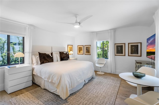 5970 Alton Rd, Miami Beach, FL 33140 - bedroom with wood finished floors and a ceiling fan