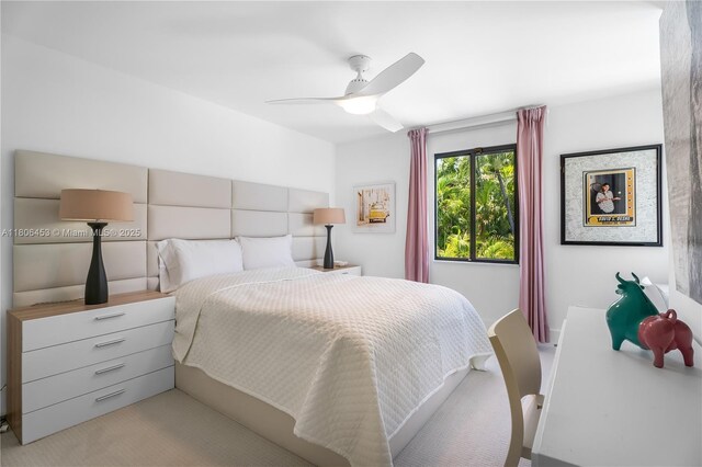 5970 Alton Rd, Miami Beach, FL 33140 - bedroom with carpet floors and ceiling fan