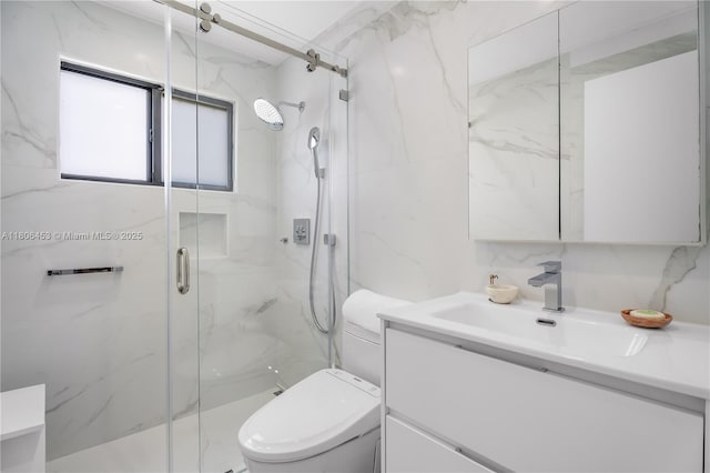 5970 Alton Rd, Miami Beach, FL 33140 - full bath featuring vanity, toilet, a marble finish shower, and tile walls