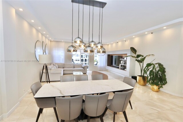 3900 Island Bl Ph 2, Aventura, FL 33160 - dining space with recessed lighting, a chandelier, light tile patterned floors, and baseboards