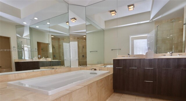 3900 Island Bl Ph 2, Aventura, FL 33160 - full bath featuring double vanity, a garden tub, a shower stall, and tile patterned flooring