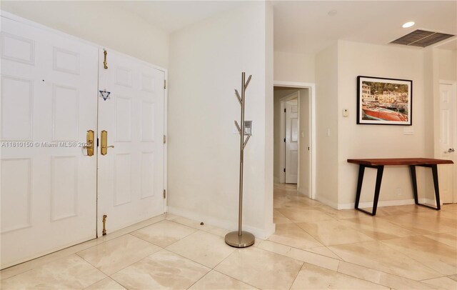 3900 Island Bl Ph 2, Aventura, FL 33160 - foyer featuring light tile patterned floors, baseboards, and recessed lighting