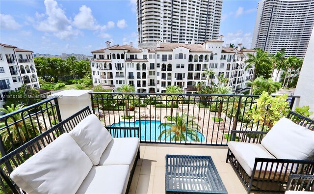 3900 Island Bl Ph 2, Aventura, FL 33160 - balcony with an outdoor hangout area and view of pool area