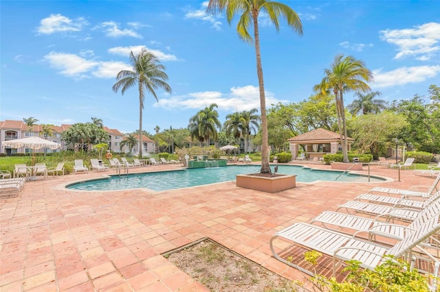 12154 Saint Andrews Pl Unit 112, Miramar, FL 33025 - community pool with a gazebo and a patio area