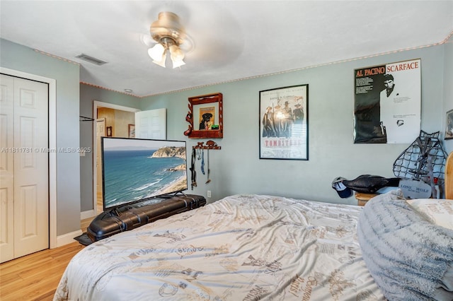 40691 Suzan Dr, Punta Gorda, FL 33982 - bedroom with wood finished floors, a closet, and ceiling fan