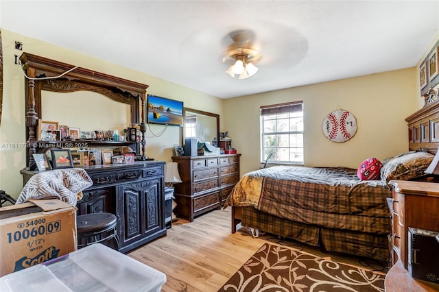 40691 Suzan Dr, Punta Gorda, FL 33982 - bedroom featuring light wood finished floors and ceiling fan
