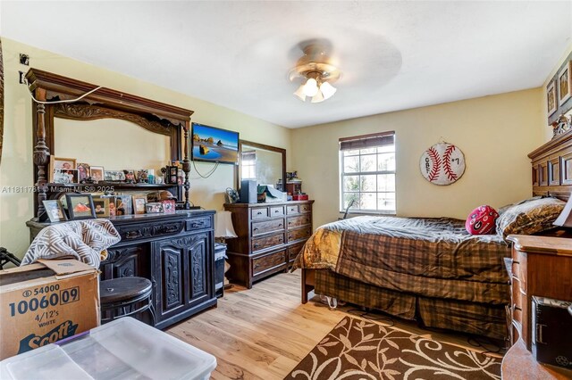 40691 Suzan Dr, Punta Gorda, FL 33982 - bedroom featuring light wood finished floors and ceiling fan