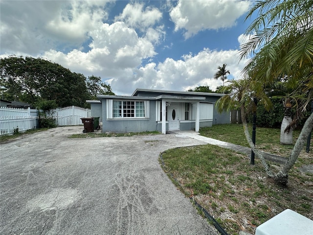 315 W 44th St, Hialeah, FL 33012 - single story home with driveway and stucco siding