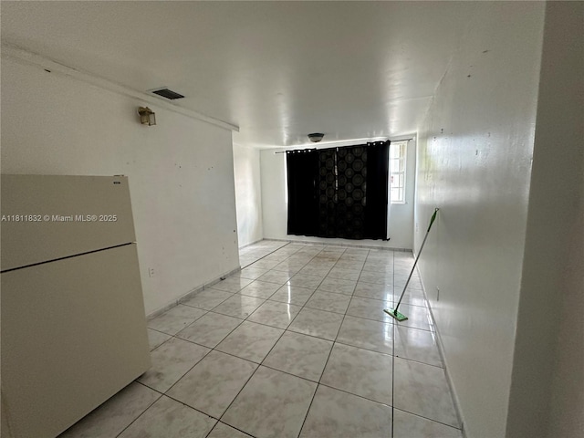 315 W 44th St, Hialeah, FL 33012 - empty room featuring light tile patterned floors