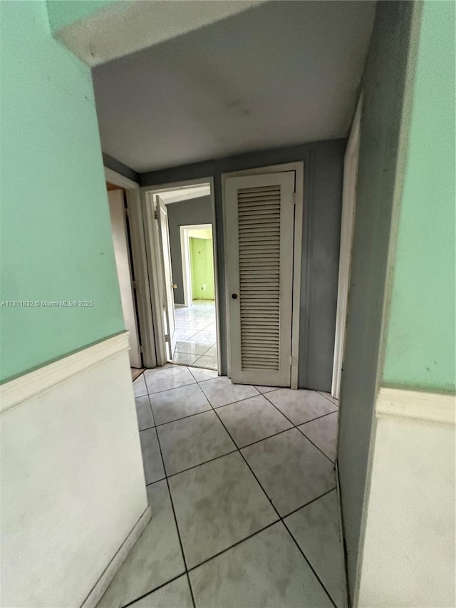 315 W 44th St, Hialeah, FL 33012 - hall featuring tile patterned floors