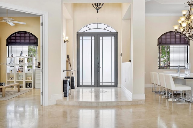 20120 SW 133rd Ave, Miami, FL 33177 - foyer with a chandelier, french doors, ornamental molding, ceiling fan, and a high ceiling