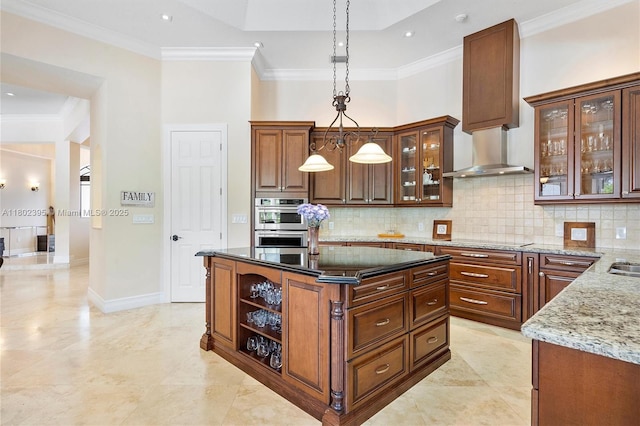 20120 SW 133rd Ave, Miami, FL 33177 - kitchen with wall chimney range hood, decorative backsplash, dark stone counters, pendant lighting, and ornamental molding