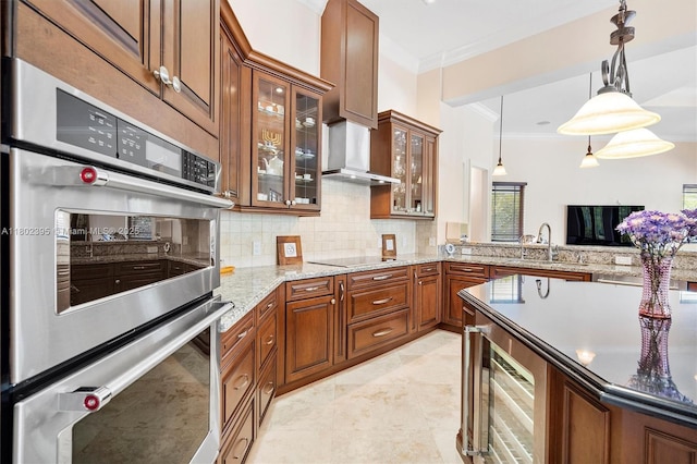 20120 SW 133rd Ave, Miami, FL 33177 - kitchen with beverage cooler, crown molding, double oven, tasteful backsplash, and a sink
