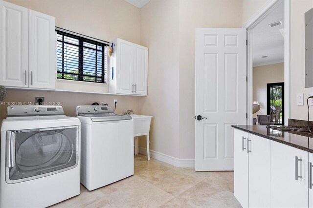 20120 SW 133rd Ave, Miami, FL 33177 - washroom featuring cabinet space, separate washer and dryer, and ornamental molding