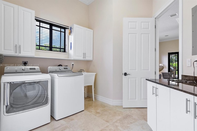 20120 SW 133rd Ave, Miami, FL 33177 - laundry area with cabinet space, independent washer and dryer, ornamental molding, and baseboards