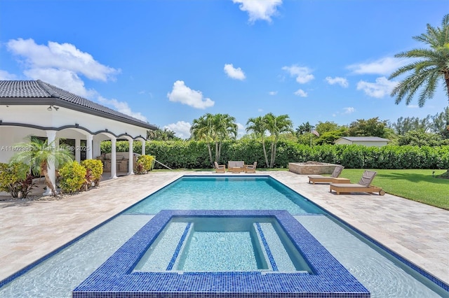 20120 SW 133rd Ave, Miami, FL 33177 - view of pool with a patio, a pool with connected hot tub, and a lawn