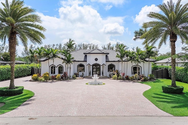 20120 SW 133rd Ave, Miami, FL 33177 - view of front facade featuring curved driveway and stucco siding
