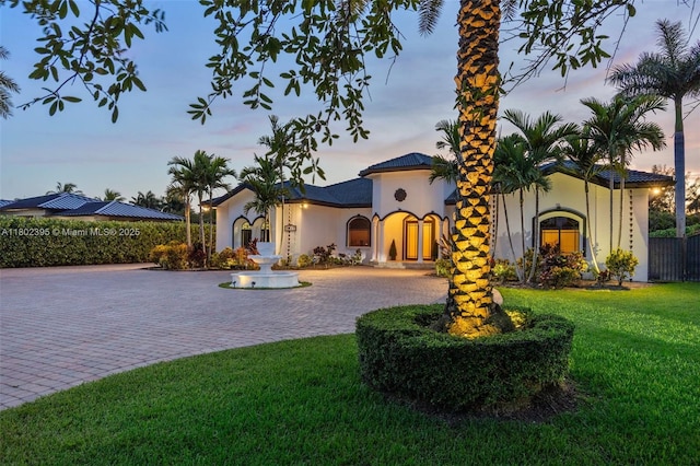 20120 SW 133rd Ave, Miami, FL 33177 - mediterranean / spanish-style home featuring curved driveway and stucco siding