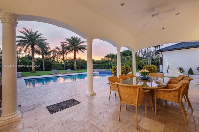 20120 SW 133rd Ave, Miami, FL 33177 - patio terrace at dusk featuring a patio, ceiling fan, and outdoor dining area