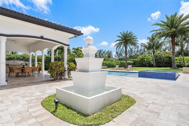 20120 SW 133rd Ave, Miami, FL 33177 - view of patio / terrace with an outdoor pool, outdoor dining area, and ceiling fan