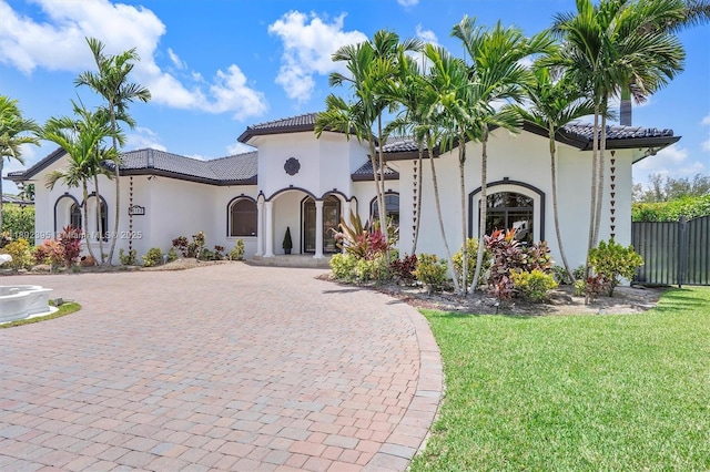 20120 SW 133rd Ave, Miami, FL 33177 - mediterranean / spanish-style home featuring decorative driveway, stucco siding, and a tiled roof