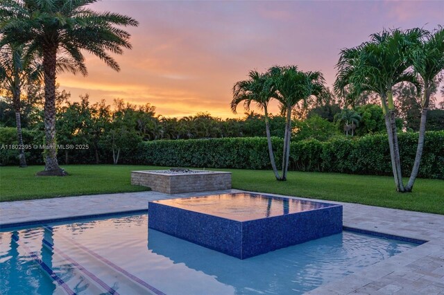 20120 SW 133rd Ave, Miami, FL 33177 - view of swimming pool featuring a lawn and a patio