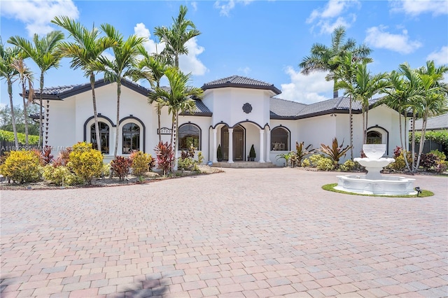 20120 SW 133rd Ave, Miami, FL 33177 - view of front of home featuring curved driveway, stucco siding, and a tiled roof