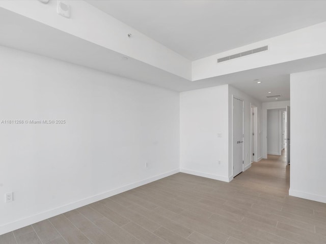 500 Alton Rd Unit 805, Miami Beach, FL 33139 - spare room with light wood-type flooring, baseboards, and recessed lighting
