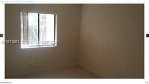 6023 10th Ave N Unit 215, Green Acres, FL 33463 - view of empty room