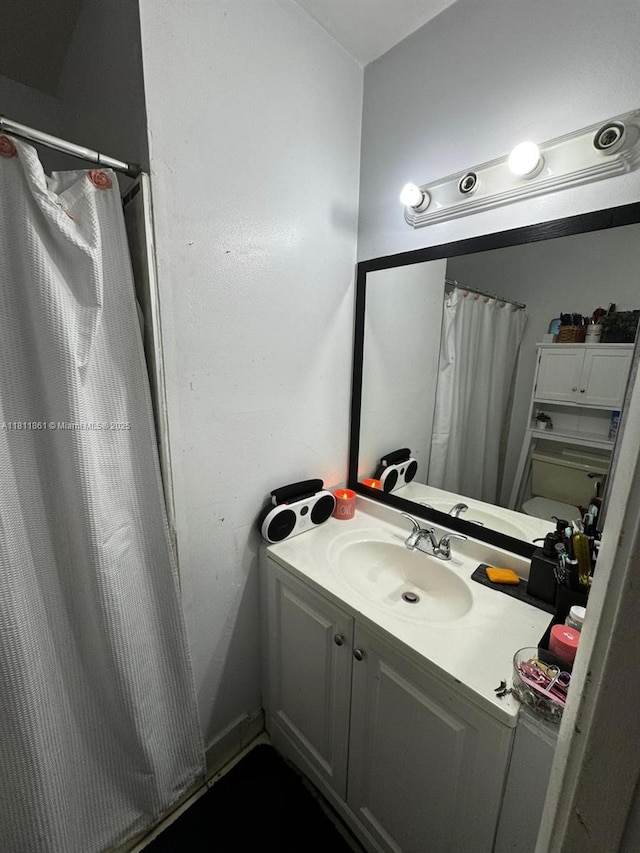 6023 10th Ave N Unit 215, Green Acres, FL 33463 - bathroom with vanity and a shower with curtain