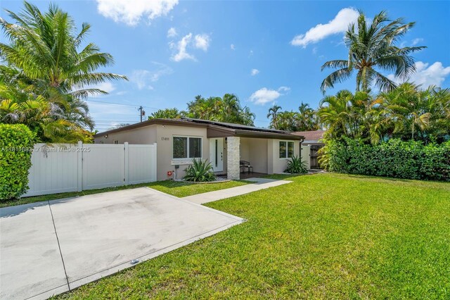 17491 NE 19th Ave, North Miami Beach, FL 33162 - back of property with a gate and stucco siding