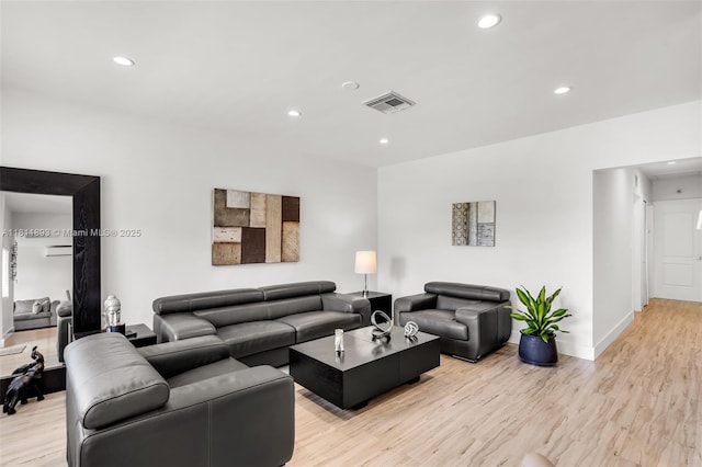 17491 NE 19th Ave, North Miami Beach, FL 33162 - living area featuring recessed lighting, light wood-style floors, and baseboards