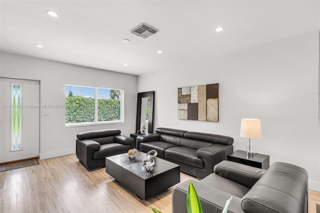 17491 NE 19th Ave, North Miami Beach, FL 33162 - living area with baseboards, recessed lighting, and light wood-style flooring