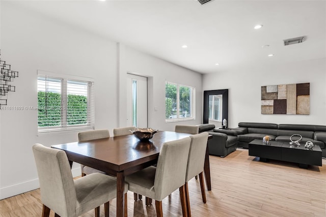 17491 NE 19th Ave, North Miami Beach, FL 33162 - dining area with healthy amount of natural light, light wood finished floors, baseboards, and recessed lighting