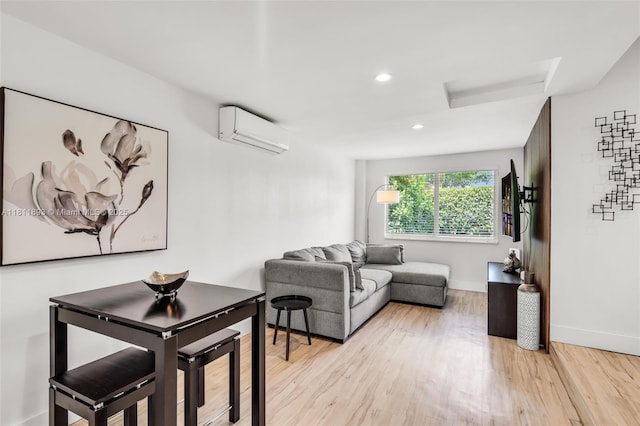 17491 NE 19th Ave, North Miami Beach, FL 33162 - living area featuring a wall mounted AC, attic access, light wood finished floors, baseboards, and recessed lighting