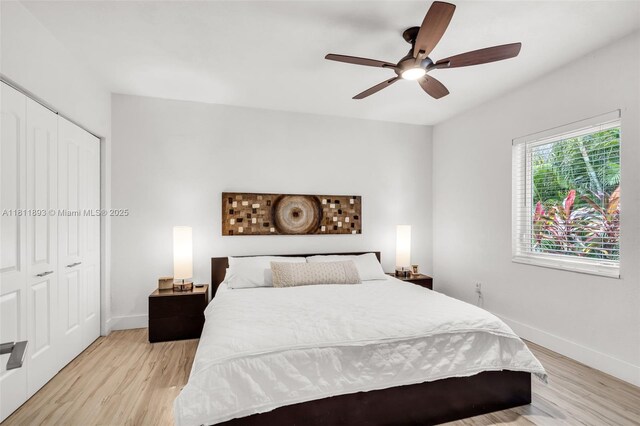 17491 NE 19th Ave, North Miami Beach, FL 33162 - bedroom featuring light wood-type flooring, baseboards, and a closet
