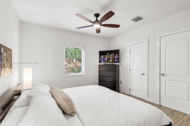17491 NE 19th Ave, North Miami Beach, FL 33162 - bedroom with wood finished floors and a ceiling fan