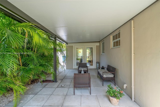 17491 NE 19th Ave, North Miami Beach, FL 33162 - view of patio / terrace featuring french doors