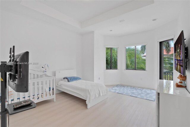 19347 SW 79th Pl, Cutler Bay, FL 33157 - bedroom with wood finished floors, baseboards, and a raised ceiling